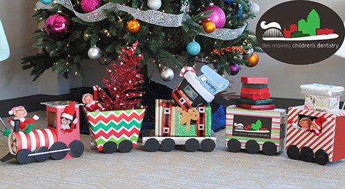 Christmas TrainDSMPD Billboard - Pediatric Dentist in West Des Moines, IA